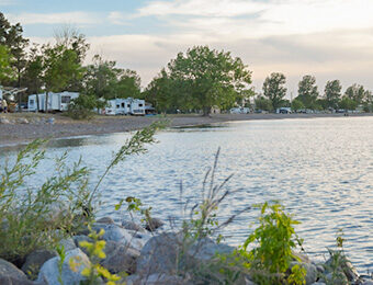 campers next to lake shore